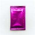 Single pink foil packet on white background Royalty Free Stock Photo