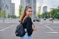 Single portrait of beautiful smiling fashionable teenage girl