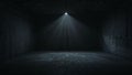 Single powerful spotlight illuminates the dark and textured empty concrete room creating dramatic shadows and strong atmospheric Royalty Free Stock Photo