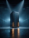 Single, prominent server rack standing in a dark, atmospheric data center corridor with rows of blue-lit racks stretching into the Royalty Free Stock Photo