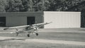 A single propeller plane taking off in Norway