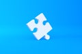Single puzzle piece on blue background Royalty Free Stock Photo