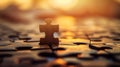 Single puzzle piece stands alone against the backdrop of a glowing sunset, suggesting an unsolved mystery or solution Royalty Free Stock Photo
