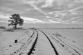 Single railway track in winter landscape. Czech Republic