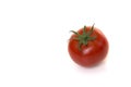 Single real tomato seen at its top isolated on a white background