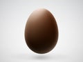 Single realistic chocolate Easter 3D egg with shadow on white background. Royalty Free Stock Photo