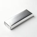 A single rectangular bar of metallic silver material placed on a plain surface Royalty Free Stock Photo