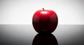 Single Red Apple Reflection on Glossy Surface Royalty Free Stock Photo