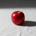 A single red apple rests on Royalty Free Stock Photo