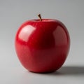 Single Red Apple on White Surface Royalty Free Stock Photo