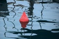 A single Red Boat Buoy