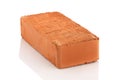 Single red brick on white background Royalty Free Stock Photo