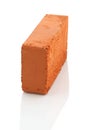 Single red brick on white background Royalty Free Stock Photo