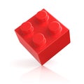 Single red building block isolated on white Royalty Free Stock Photo