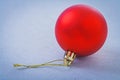 Single Red Christmas Ball On Gray Background