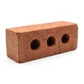Single Red Clay Brick with Three Circular Holes on a White Background building material Royalty Free Stock Photo