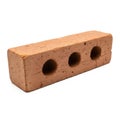 Single Red Clay Brick with Three Circular Holes on a White Background terracotta building material Royalty Free Stock Photo