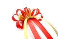 Single Red gift bow. Ribbon isolated on white background. Royalty Free Stock Photo