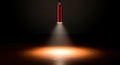 A single red pencil with a dramatic spotlight effect illuminating its point white background Royalty Free Stock Photo