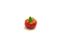 Single red ripe hot cherry pepper or pimiento heart-shaped chili pepper isolated on white