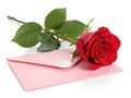 Single red rose with envelope isolated on white background Royalty Free Stock Photo