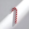 Single red and white striped candy cane with precise and evenly spaced stripes, isolated on a bright and pristine white background Royalty Free Stock Photo