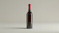 Single red wine bottle isolated on clear white background for elegant presentation Royalty Free Stock Photo