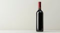 Single red wine bottle isolated on pristine white background for elegant presentation Royalty Free Stock Photo