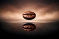 Single Roasted Coffee Bean Levitation Above Water Surface With Perfect Reflection Under Dramatic Warm Studio Lighting Royalty Free Stock Photo