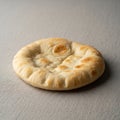 A single round flatbread rests on Royalty Free Stock Photo