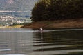 Single rower at sunrise