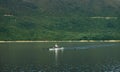 Single rower at sunrise