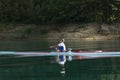 Single rower at sunrise