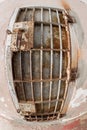 Single rusted steel prison door with latches for locks