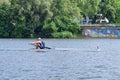 Single scull rowing competitor on the Neckar River during the boat racing Heidelberg Regatta 2018