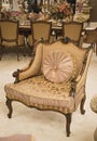 A single seat armchair aka bergere with a classic design