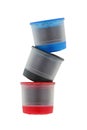 Single serve Coffee capsules in blue, black and red isolated on Royalty Free Stock Photo
