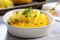 a single serving of roasted spaghetti squash in a baking dish