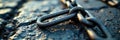 Single severed chain link on coarse stone surface , separation, piece, surface Royalty Free Stock Photo