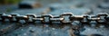 Single severed chain link on coarse stone surface , texture, hardware Royalty Free Stock Photo