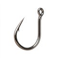 Close up of a sharp metal fishing hook with a curved shank and eyelet Royalty Free Stock Photo