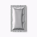 Single silver packet with grid-like border on white background Royalty Free Stock Photo