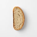 A conceptual and minimalist close-up of a single slice of bread, isolated on a stark white background Royalty Free Stock Photo