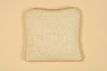 Single Slice of Fresh White Bread on Beige Background Royalty Free Stock Photo
