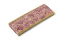 Single slice of traditional Belgian brawn, head cheese, on white background Royalty Free Stock Photo