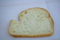 Single slice of white bread on clean background for breakfast and food preparation concept Royalty Free Stock Photo