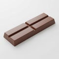 A single rectangular bar of milk chocolate with four scored sections on a light gray background Royalty Free Stock Photo