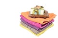Single soap dish on top of facecloths Royalty Free Stock Photo