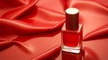 A single Solitary glamorous red nail polish on a red background Royalty Free Stock Photo