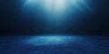 A Single Spotlight Illuminating a Dark Blue Surface Royalty Free Stock Photo